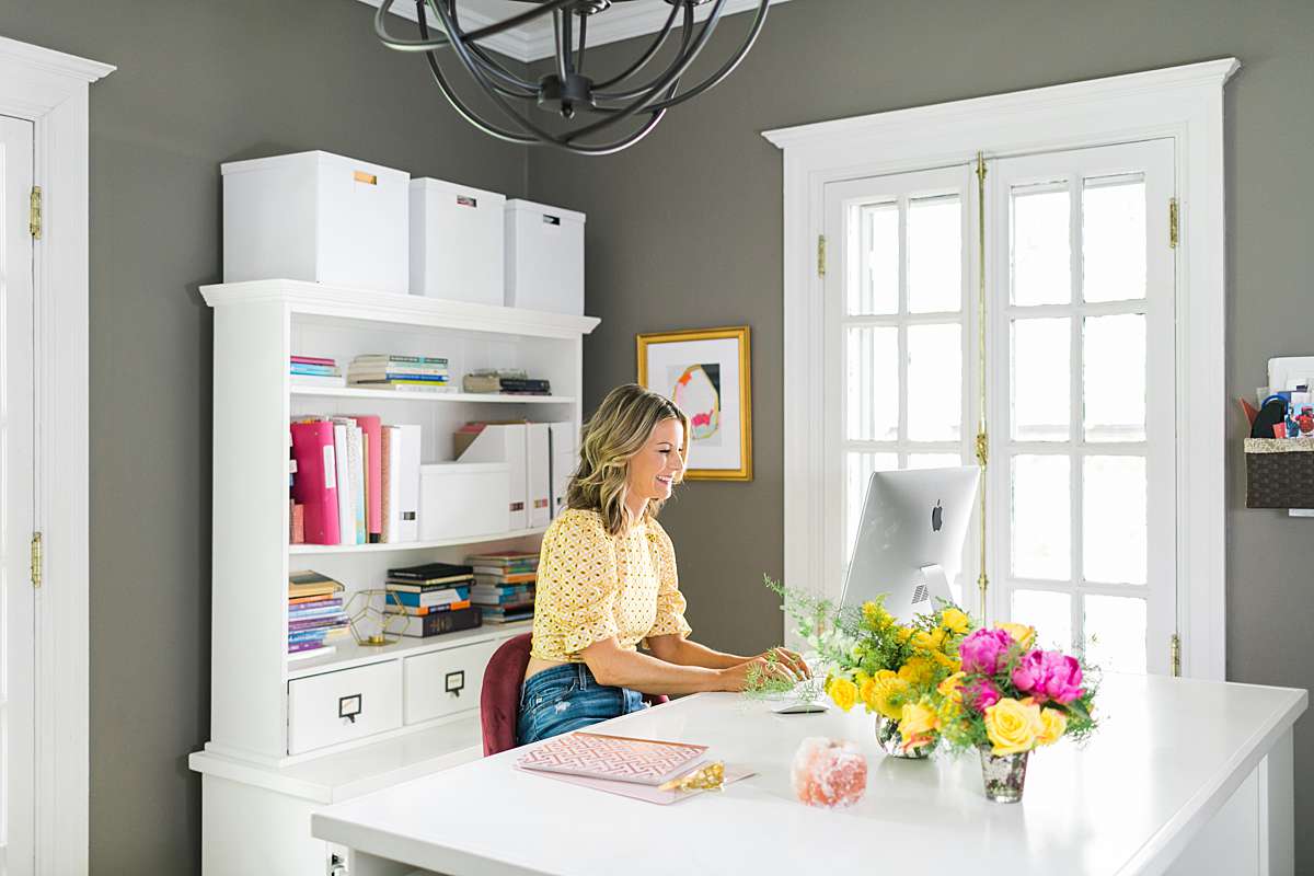 woman business owner sitting at a desk
