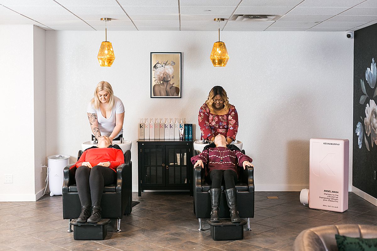 woman at salon getting hair washed