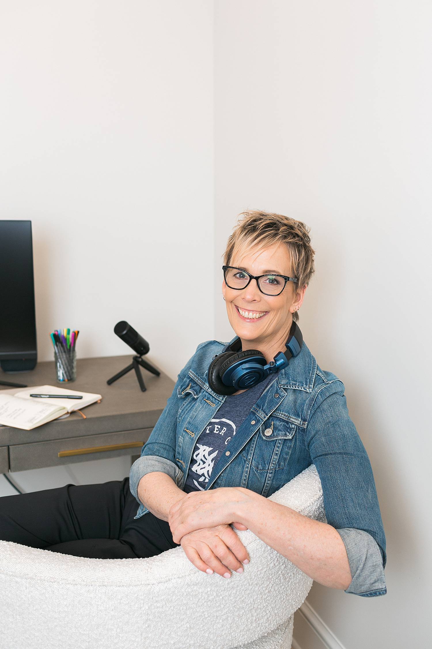 woman headshot brand photo while podcasting
