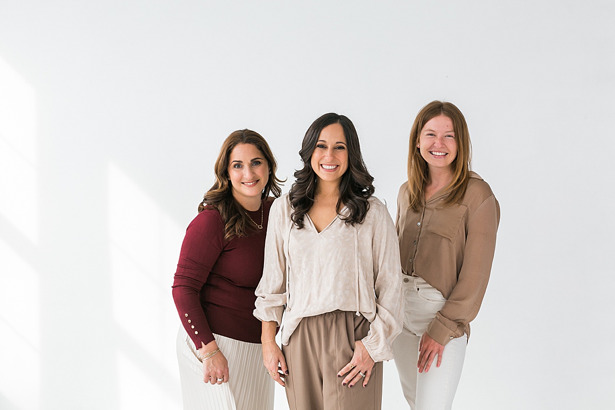 group of three women, group headshot of travel designer team