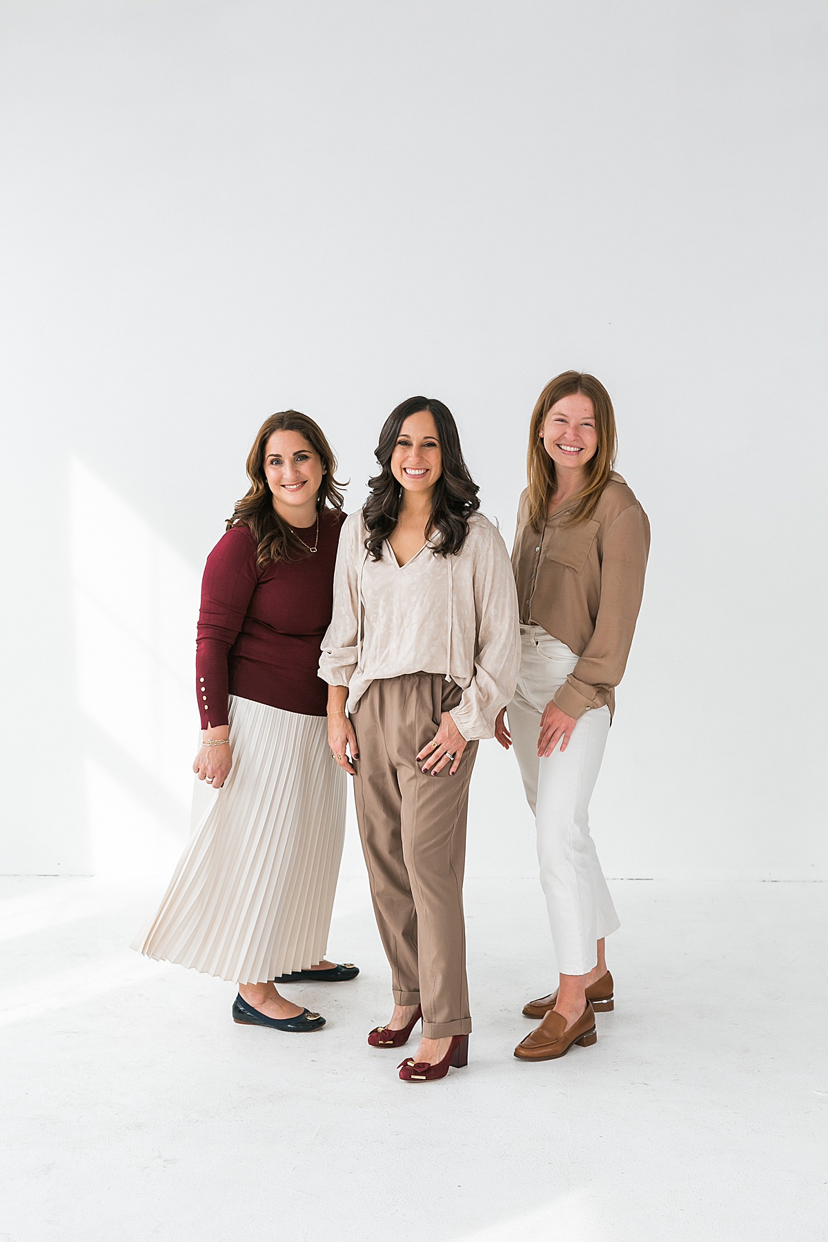 team of women at brand photoshoot, luxury travel designer team
