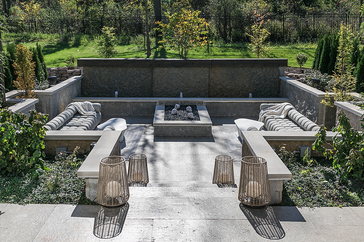 pool house outdoor seating area living space gray color scheme and landscaping